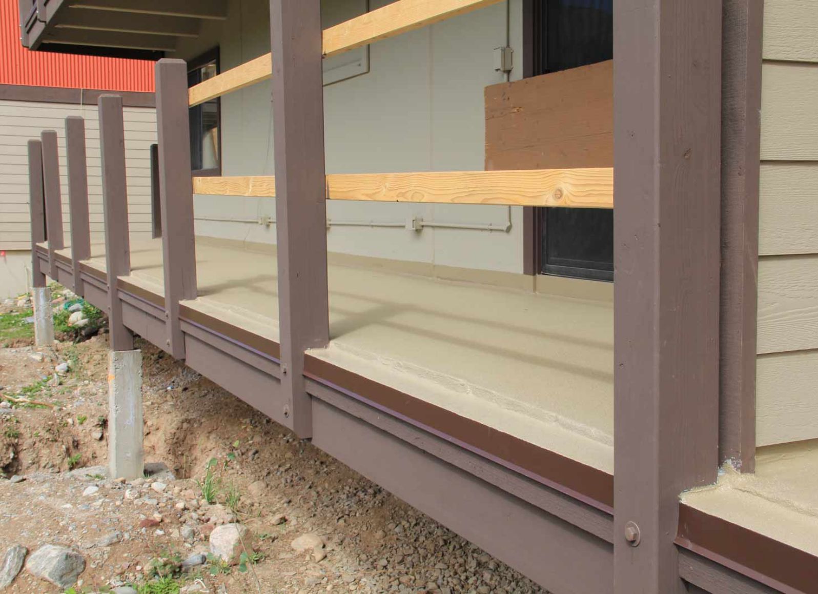 Completed-Deck-Shot-Desert-Tan@2x Ski and Racquet<br />
Club Condominiums