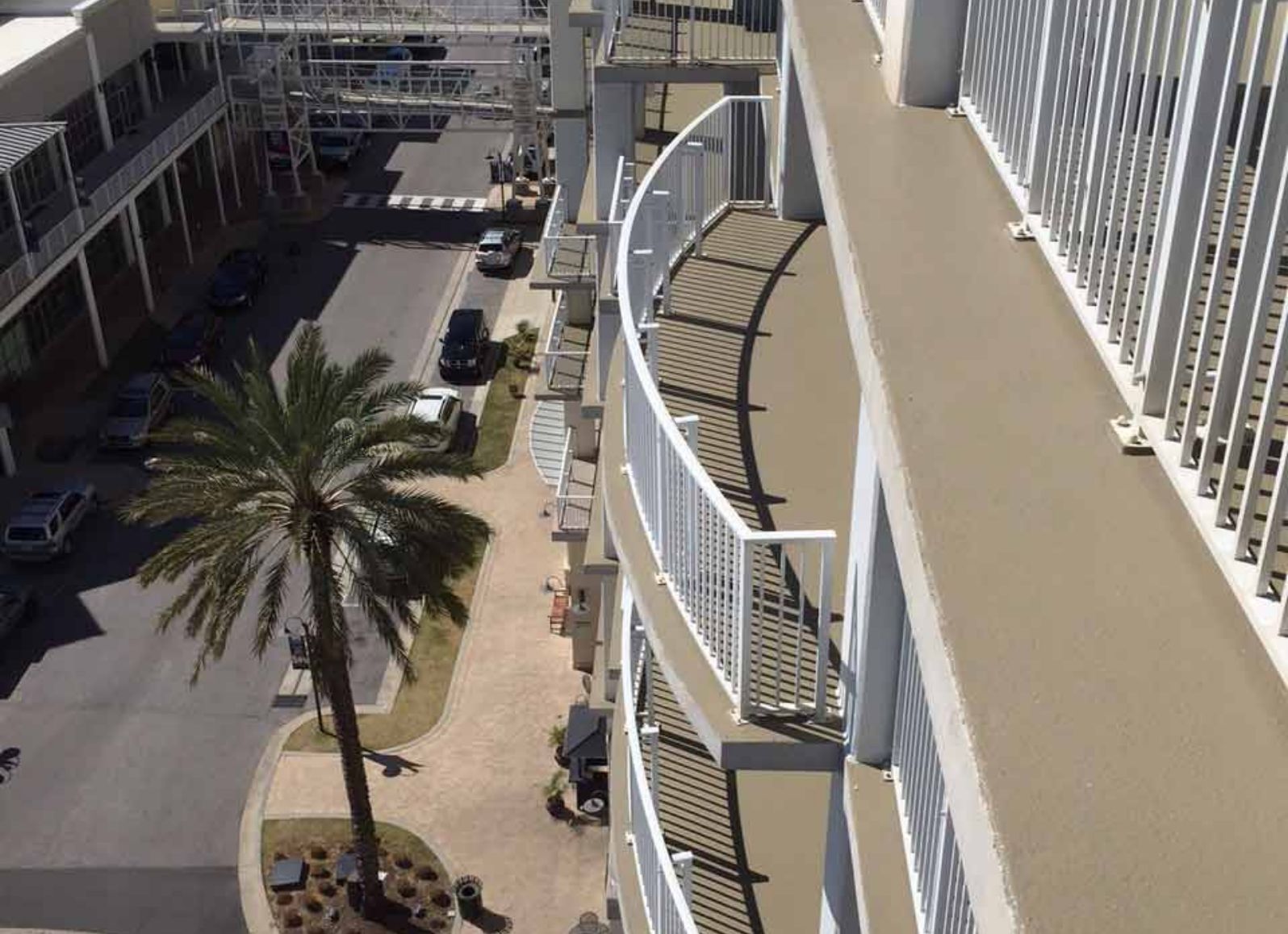 Exterior-balcony-and-walkways-in-background@2x The Wharf